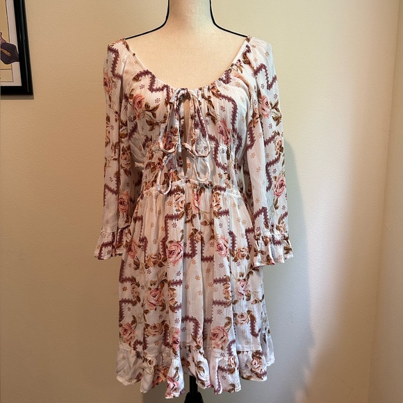 ASOS Design 70s Boho Pink and White Floral Bell Sleeve Ruffle Mini Dress - Picture 5 of 9